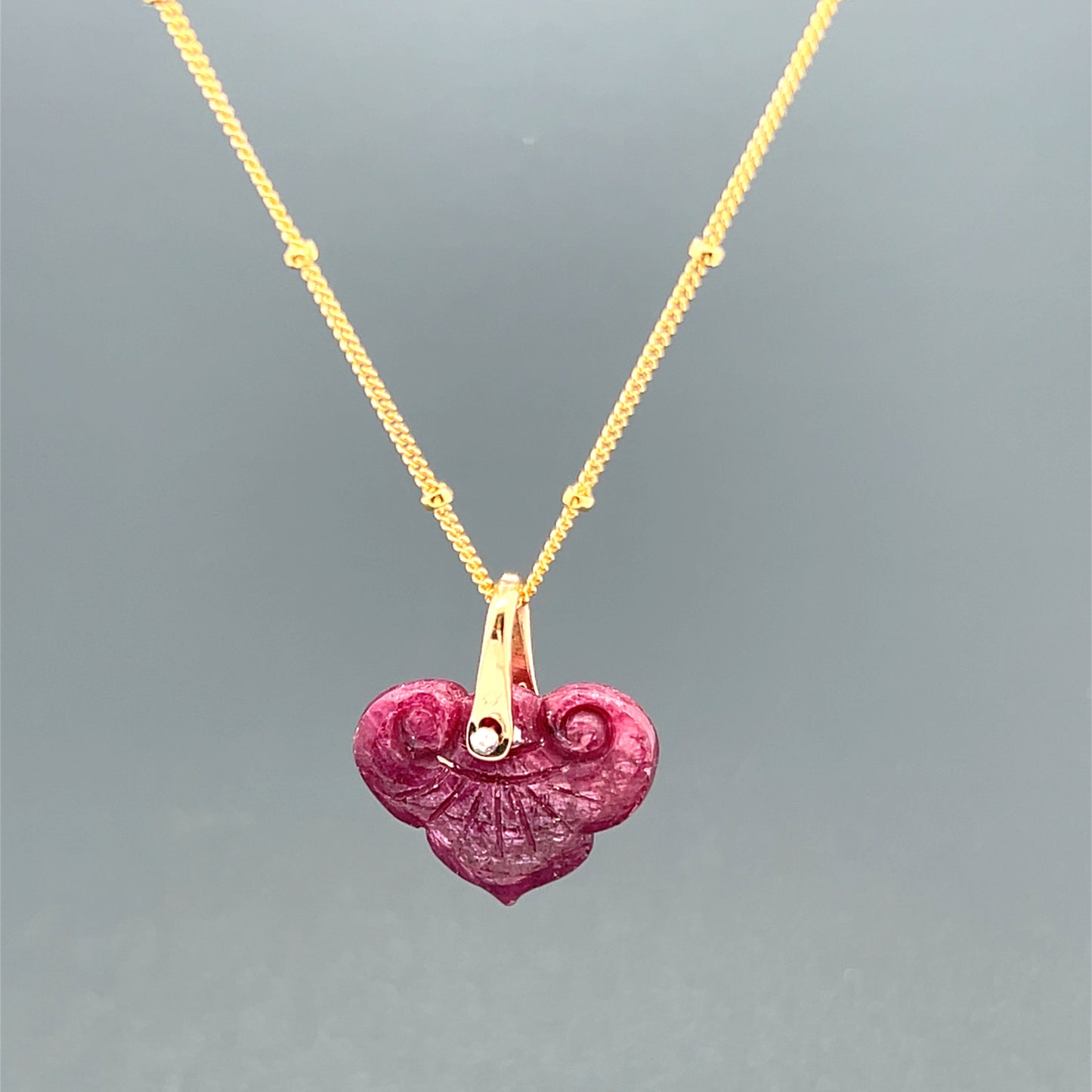 Carved Ruby Pendant