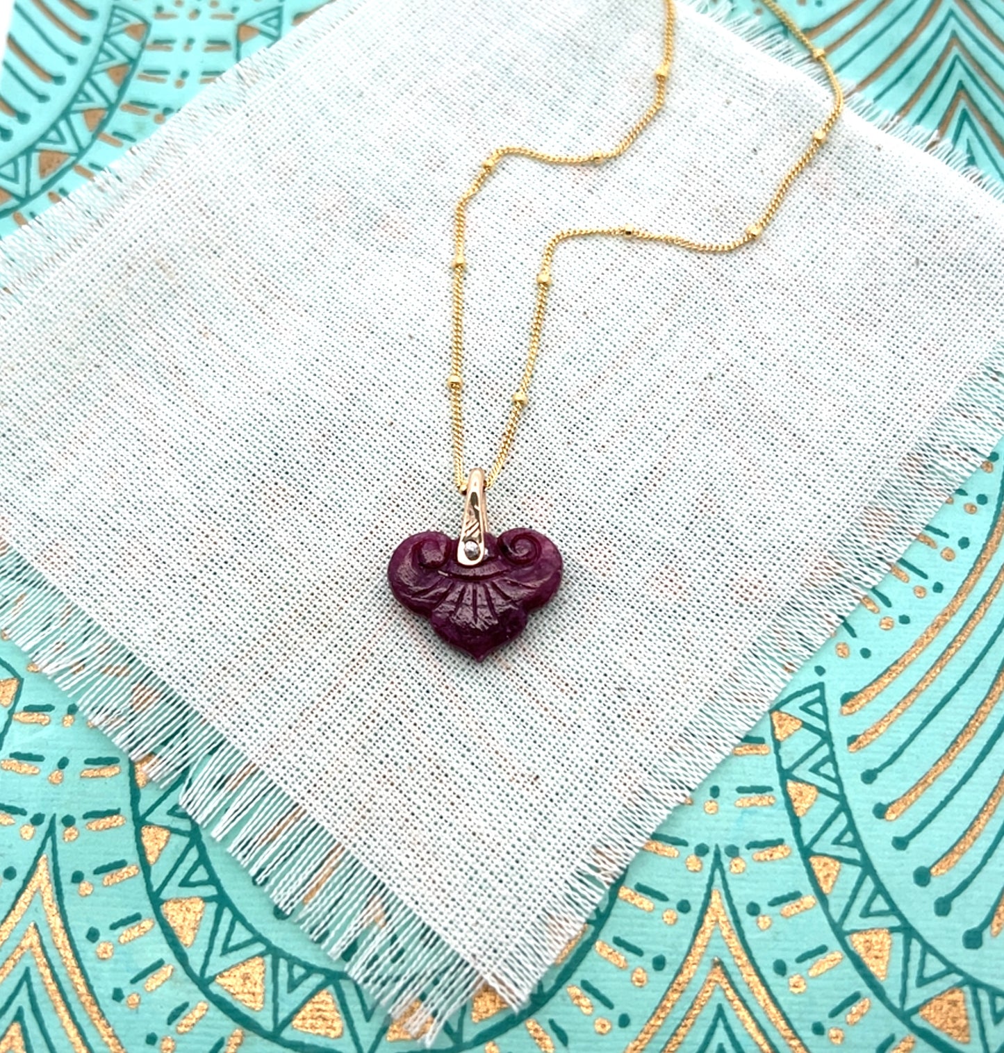 Carved Ruby Pendant